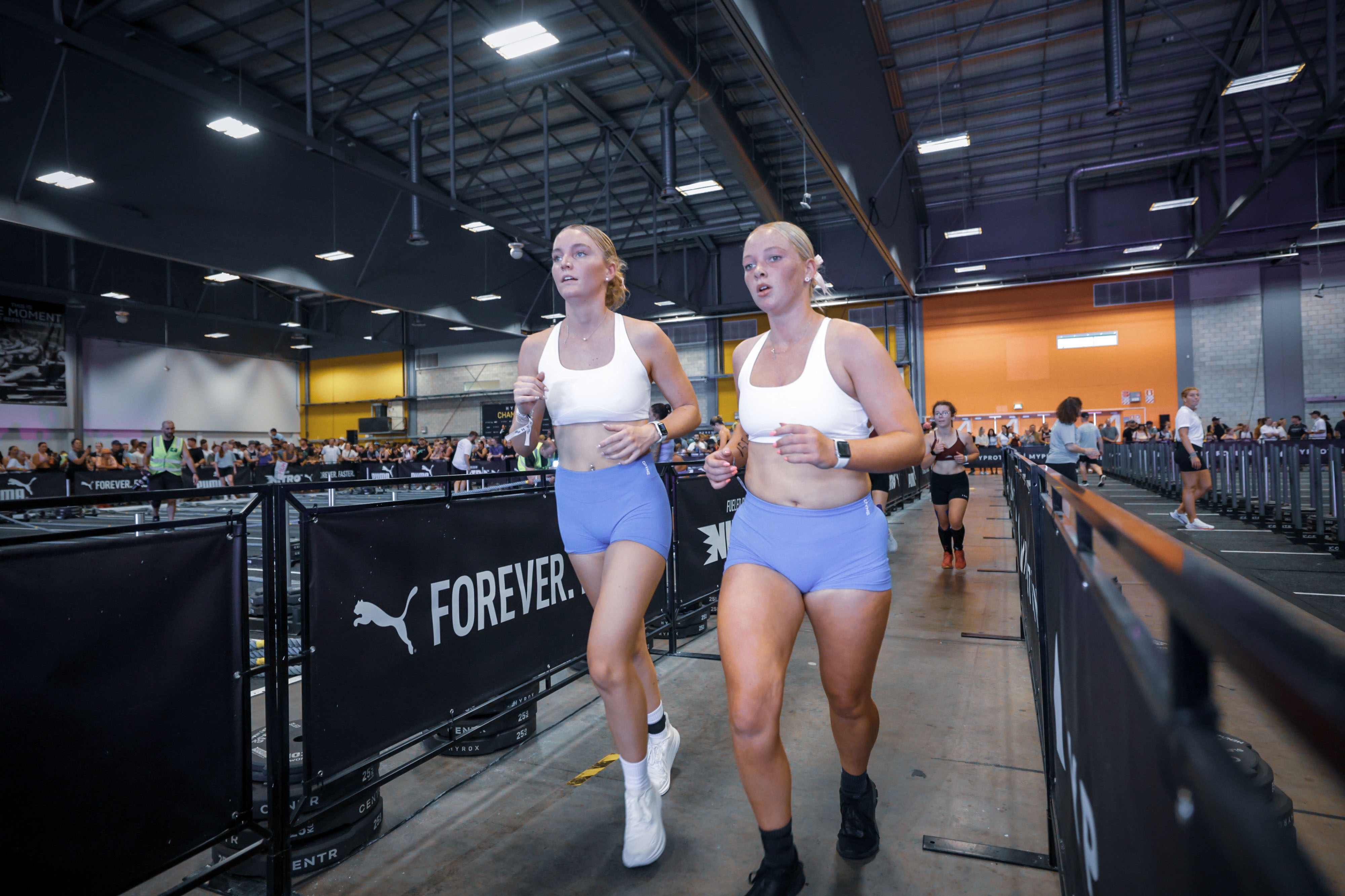 A runner on an urban street during a club event